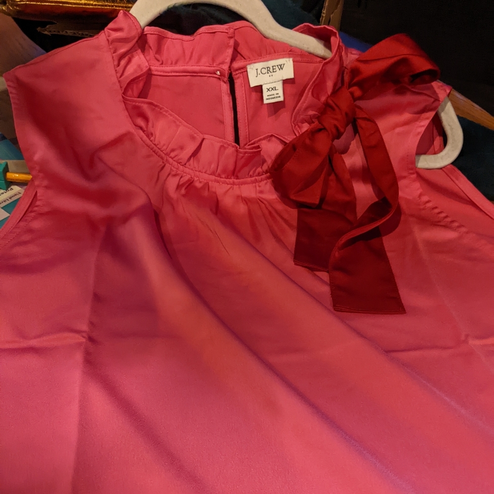 Sleeveless, polyester, hot pink and red top.